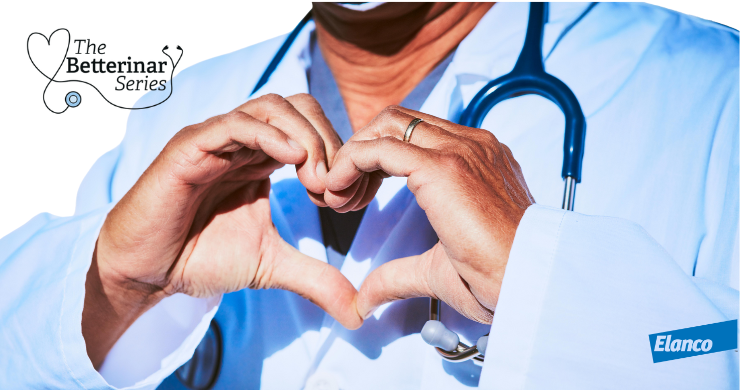 Male doctor or vet doing love heart hand sign