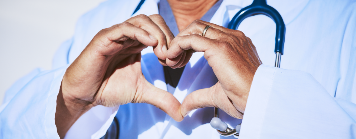 Vet making love heart with hands
