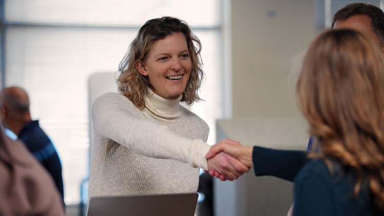 Woman shaking hands