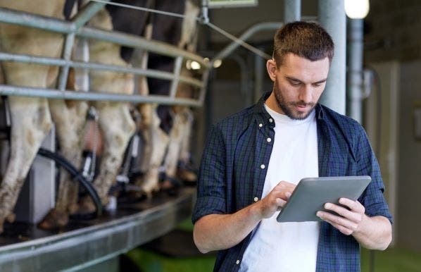 Farmer with tablet