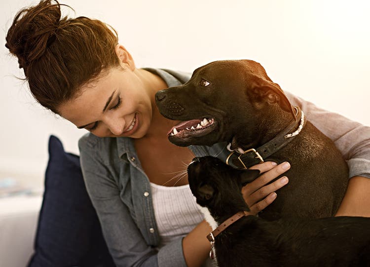 woman with black lab