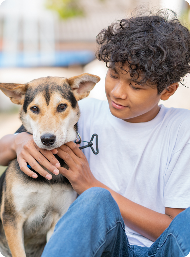 Boy with his adopted dog