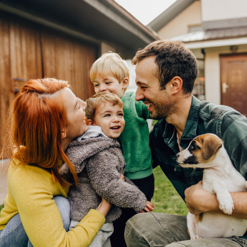 Family with two kids and a dog