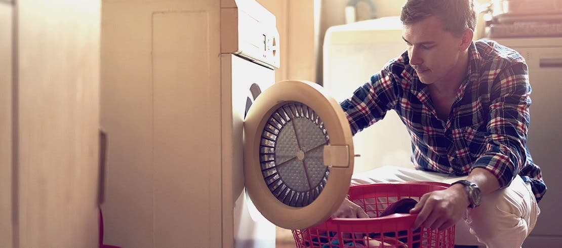 Person washing their household items to kill all fleas eggs and larvae